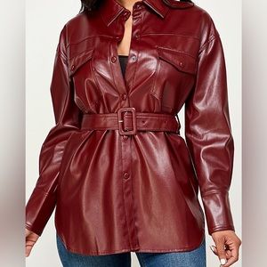 Wine colored faux leather top. Can be worn as a jacket. Suede lining inside.
